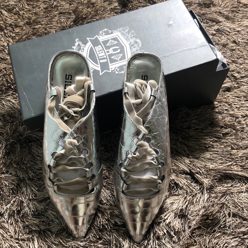 Silent D mules sold by Free People